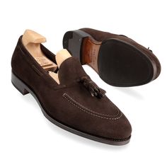 TASSEL LOAFERS IN BROWN SUEDE Luxury Tassel Loafers With Italian Craftsmanship For Office, Luxury Leather Tassel Loafers With Brogue Detailing, Luxury Leather Tassel Loafers With Cap Toe, Luxury Suede Tassel Loafers With Almond Toe, Luxury Calf Leather Tassel Loafers With Plain Toe, Classic Leather Shoes With Heel Tab And Almond Toe, Classic Leather Shoes With Almond Toe And Heel Tab, Luxury Classic Calf Leather Tassel Loafers, Formal Closed Toe Moccasins With Suede Lining