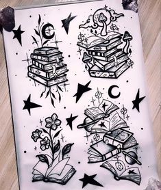 an ink drawing with books and stars on it