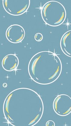 an image of bubbles and stars on a blue background that looks like it is floating in the air