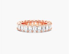 14K Rose Gold Emerald Cut Diamond Eternity Ring (2 CTW H-I / SI1-SI2). This timeless eternity ring features the boldness and elegant gleam of emerald cut diamonds. A classic, tailored shared prongs setting allows the maximum amount of the diamonds surface to show. Number of diamonds and carat total weight will vary depending on ring size. Diamond Eternity Ring, Jewelry Photoshoot, Emerald Cut Diamond, Eternity Ring Diamond, Diamond Eternity, Emerald Cut Diamonds, Eternity Ring, Emerald Cut, Diamond Shapes