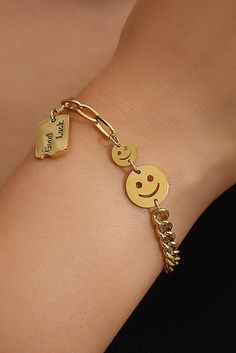 Enhance your luck with our Gold Good Luck Smile Face Adjustable Chain Bracelet. Made of high-quality gold, this bracelet features a charming smile face design and an adjustable chain for a perfect fit. Channel positivity and good vibes with this stylish and meaningful accessory. Adjustable Gold Bracelets With Smiley Face, Gold Smiley Face Bracelets As Gift, Trendy Gold Bracelets With Smiley Face, Good Luck Bracelet, Next Fashion, Activewear Fashion, Gold Bracelet Chain, Face Design, Good Fortune