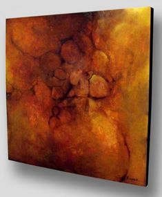 an abstract painting with orange and yellow colors on the canvas, it looks like something from space