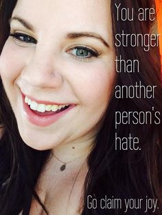 a woman smiling with an orange background and quote about being in the same place as you are