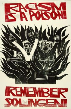 a poster with an image of two people surrounded by flames and the words racism is a prison