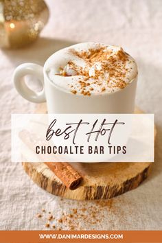 a cup of hot chocolate with cinnamon sprinkles and the words best hot chocolate bar tips