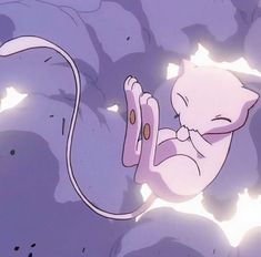 a pink cat laying on top of a bed next to a purple wall with light coming from it