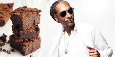 a man wearing sunglasses next to a pile of brownies with chocolate chips on top