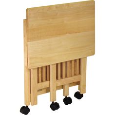 a wooden table with wheels on it and a cutting board attached to the back of it