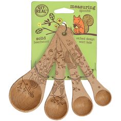 wooden measuring spoons with animals on them