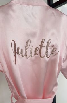 The perfect robe for a celebration!  Be it for a flower girl, birthday girl or just because! Our satin robes are light, soft and personalized with sparkly glitter letters in our signature font. Colors: Pink with Rose Gold or White with Silver. Robe is available with a name/word on the back and room for an initial OR on Pink Silk Robe, Personalized Robes, Pijama Party, Satin Robes, Personalized Robe, Girls Robes, Ballerina Girl, Glitter Letters, Bach Party