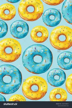 a lot of donuts that are blue and yellow with sprinkles