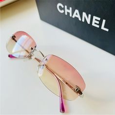 Rare Vintage Chanel Pink 4002 Rimless Sunglasses. Extremely Rare Pink Color. Authentic With Serial Number. Excellent Condition. No Visible Scratches. As Seen On Bella Hadid And Other Celebrities. Comes With The Original Chanel Hard Case. Buying These Vintage Sunglasses You’re Supporting Small Business! Designer Rimless Summer Sunglasses, Designer Rimless Sunglasses For Summer, Rimless Sunglasses With Gradient Glass Lenses, Chanel Pink, Pink Chanel, Pink Sunglasses, Chanel Accessories, Rimless Sunglasses, Vintage Sunglasses