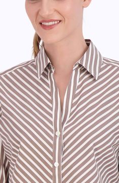 Look crisp and polished all day in this striped shirt made from a non-iron cotton blend. 26" length (size 8) Spread collar Long sleeves with one-button cuffs 62% cotton, 33% polyester, 5% spandex Machine wash, tumble dry Imported Elegant Striped Button-up Dress Shirt, Spring Workwear Dress Shirt With Striped Collar, Elegant Striped Shirt For Office Wear, Elegant Pinstripe Dress Shirt For Business Casual, Striped Button-up Dress Shirt For Formal Occasions, Classic Striped Shirt For Workwear, Formal Striped Button-up Dress Shirt, Elegant Dress Shirt With Striped Collar For Work, Elegant Dress Shirt With Striped Collar