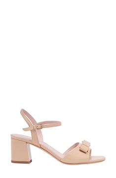 A prim branded bow puts a polished finish on the patent-leather toe strap of this quarter-strap sandal set on a walkable block heel. 2" heel Adjustable ankle strap with buckle closure Leather upper, lining and sole Imported Strap Sandals Women, Beach Sand, Sandal Women, Kate Spade New York, Strap Sandals, Patent Leather, Block Heels, Ankle Strap, Kate Spade