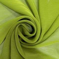 a close up view of a green fabric