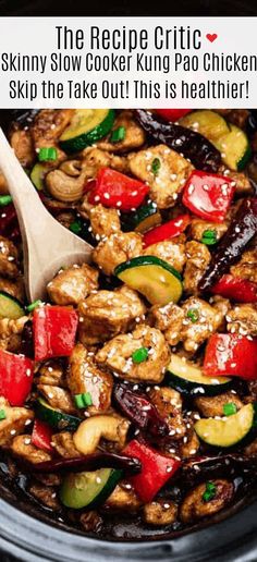 chicken and vegetable stir fry in the slow cooker with a wooden spoon, ready to be cooked