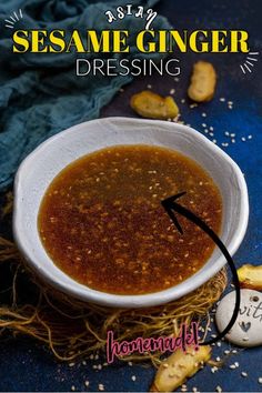 an image of sesame ginger dressing in a white bowl with peanuts around it and the words homemade ginger dressing below