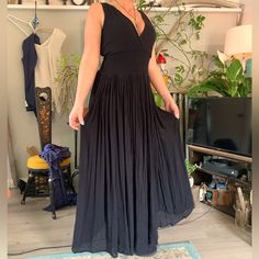 Absolutely Stunning And Versatile Black Dress. Brand New With Tags : Size Medium. Material Content Is Available In The Pictures And Model Is 5’4. Please Feel Free To Ask Questions And Make Offers! V-neck Pleated Beach Maxi Dress, V-neck Pleated Maxi Dress For Beach, Pleated V-neck Maxi Dress For Beach, Black Sleeveless Pleated Maxi Dress, Fitted Rayon Maxi Dress For Night Out, V-neck Rayon Maxi Dress For Casual Wear, Casual V-neck Rayon Maxi Dress, Fitted Black Pleated Maxi Dress, Black Flowy Rayon Maxi Dress