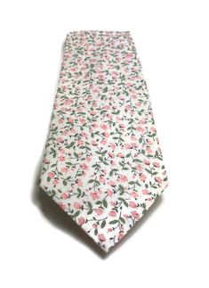 This listing is for one 100% cotton pink floral necktie.  Use drop down list for necktie size and pattern. Don't like this color or print?  Convo me, I love custom orders and I'm sure we can find a fabric that will work for you. Interested in an order for your wedding party?  Tux and Tulle neckties and bow ties are a perfect gift for your groom, groomsmen, and ring bearers. Mix and match prints to create a unique and personalized look for your bridal party.  Request a custom order on my site or Pink Floral Tie Wedding, Pink Floral Tie, Classic Pink Tie For Spring, Classic Pink Ties For Spring, Classic Pink Tie Accessories For Summer, White Ties For Spring Gift, White Cotton Ties For Gifts, White Ties As Spring Gifts, White Ties Neckwear For Spring