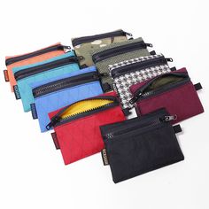 Dash Wallet Functional Rectangular Wallet With Zipper Pouch, Travel Bifold Card Holder With Zipper Pouch, Casual Wallet With Card Slots In Pouch Shape, Casual Wallets With Card Slots In Pouch Shape, Daily Use Pouch Card Holder With Zipper, Casual Pouch Wallets With Card Slots, Bifold Coin Purse With Zipper Pocket For Everyday, Everyday Bifold Coin Purse With Zipper Pocket, Everyday Rectangular Card Holder With Zipper