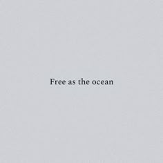 the words free as the ocean are black and white