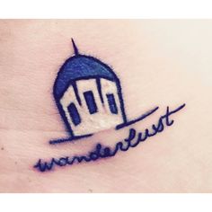 a small tattoo with the words wanderlust on it