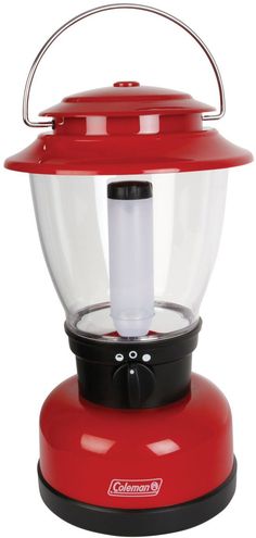 a red and black lantern with a white light on it's top is sitting in front of a white background