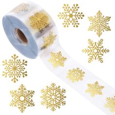 gold snowflakes and glitter tape on white background