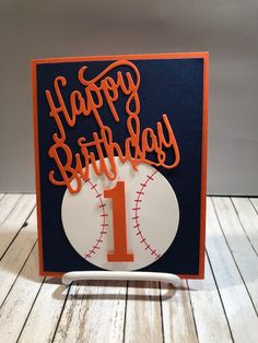 a baseball themed birthday card with the number one on it and happy birthday written in orange