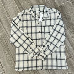 Nwt Size Large Essential Plaid Flannel Shirt By Standard Cloth. Classic Fit In Soft Flannel With A Button Front And Camp Collar. Cut With A Straight Hem And Finished With A Chest Pocket. Urban Outfitters Exclusive. Content + Care - 60% Polyester, 40% Cotton - Machine Wash - Imported Standard Cloth Is Committed To Using Quality Materials, Offering Great Fits And Leaving No Detail Unconsidered. These Are Your New Favorites. Flannel Tops With Snap Buttons, Long Sleeve, Long Sleeve Flannel Tops With Snap Buttons, White Cotton Flannel Shirt With Button Closure, Flannel Top With Snap Buttons And Collared Shape, Collared Plaid Shirt With Snap Buttons, Casual Flannel Button-up Top, Casual Plaid Shirt With Snap Buttons, White Cotton Long Sleeve Flannel Shirt, White Long Sleeve Cotton Flannel Shirt