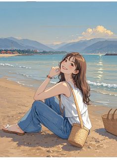 a woman sitting on top of a beach next to a basket and water with mountains in the background