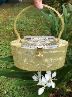 "Thank You If You Have Favored One of My Items! You Will Receive 10% Off an Item of Your Choice, Unless It is on Sale, CODE17. Thank You. YELLOW LUCITE HANDBAG/ Lucite Handbags/Lucite Purses/Lucite Bags/Patricia Of Miami Handbags/Vintage Lucite Purses/Near MINT Condition Near MINT Condition - GORGEOUS Near MINT CONDITION, no chips, cracks, warping,   ghosting, or smells, some very tiny invisible scratches on the right side top,   only visible under bright light and scrutiny, includes lucite feet Vintage Lucite Purses, Bright Light, Birmingham, Purses And Handbags