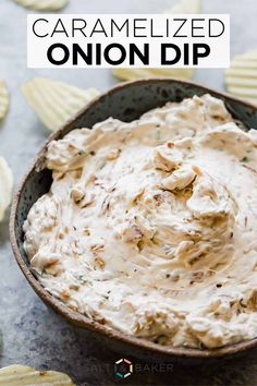 homemade caramelized onion dip in a bowl with crackers on the side and text overlay