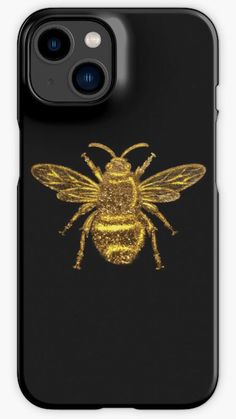 a gold bee on black phone case with the image of a honeybee in it