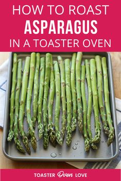 asparagus in a roasting pan with text overlay how to roast asparagus in a toaster oven