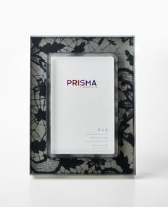 a black and white photo frame with the words prism in red on it's side