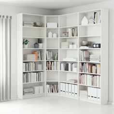 a white book shelf filled with lots of books