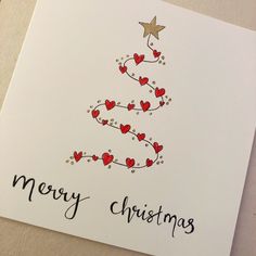 a card with a christmas tree on it