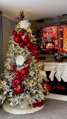 a christmas tree decorated with red and white ornaments