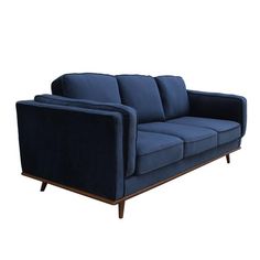 a blue couch sitting on top of a wooden frame