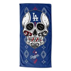 a towel with a baseball skull and los angeles angels logo on the front in blue