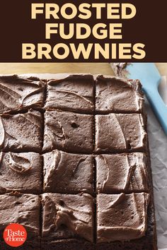 chocolate frosted fudge brownies on a cutting board with the title above it