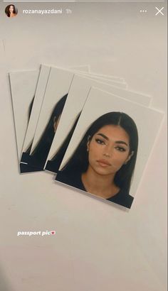 three photos of a woman with long hair and brown eyes are shown on the phone screen