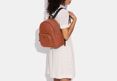 Our Court Backpack elevates your backpack game without sacrificing space for the essentials. Crafted of pebble leather, this backpack features a roomy interior, double zip closure and outside zip pocket. You can easily slip items in the outer side pockets to keep them accessible, making this style a favorite for every day—whether you’re heading to work, school or a day out with friends. Coach Outlet, Pebbled Leather, To Work, Zip Pockets, Outlet, Every Day, The Outsiders, Backpacks, Leather