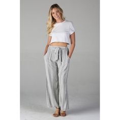 Your Go To Spring/Summer Pants Are Here! These Wide Leg Pants Features An Elastic Waistband In The Back, A Tie Sash In The Front (Or You Can Tie It In The Back), And Pockets! The Way The Black And White Threads Are, Gives The Look Of Gray Stripes. Materials: 100% Rayon Color: Black & White O13 Casual Summer Pants With Tie Waist, White Summer Wide Leg Pants With Elastic Waistband, White Wide-leg Pants With Tie Waist, White Tie Waist High-waisted Pants, White High-waisted Pants With Tie Waist, White Summer Pants With Tie Waist, White Bottoms With Tie Waist For Day Out, Summer Bottoms With Tie Waist For Day Out, Summer Style White High-waisted Wide Leg Pants