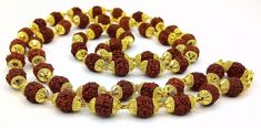 54 beads Rudraksha japp mala for praying to god ,Certified 22kt yellow gold handmade amazing Rudraksha beads chain necklace jewelry from rajasthan india Metal-22 karat yellow gold . Brand-Traditional-jewellery. Length-25 inches. Weight-25.00 grams approx. Width-6 to 6.5 mm approx. Marking-916/22k stamp sign /hallmarked Material-Gold/Rudraksha Makes excellent gifting and collectible pieces. if any tax is applicable at buyers country, buyer has to pay all such taxes as per law. For more informatio Gold Rudraksha, Gold Pendent, Rudraksha Mala, Cute Mobile Wallpapers, Rudraksha Beads, Beads Chain, Unisex Jewelry, Traditional Jewelry, Men's Jewelry