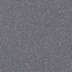 an asphalt surface with small speckles on the top and bottom, in grey tones