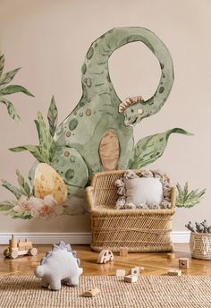 a child's playroom with toys and wallpaper on the walls, including a green dinosaur