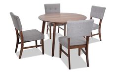 a set of four chairs and a table with one chair up against the other side