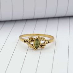 Product:-Ring Material:- Brass Size:- All size available Gemstone:- Peridot    Peridot Leaf Ring, Gold Ring, Wedding Ring ,Flower Ring, Stacking Ring,Marquise Cut Ring ,Peridot Ring,Boho Ring ,Minimal Ring,Promise Ring, ❥ Customers' satisfaction is our biggest priority, please contact us with any questions/queries for future or existing orders, and we will do our best to make sure you are happy with your order. ❥Please make sure to add the correct address during checkout. You can return your purchased item within 15 days after successful delivery. We offer a 100% "Money Back Guarantee" if you are not satisfied with your purchase. ❥If you are not satisfied with your purchased items then contact with us first before leaving negative or neutral feedback or opening disputes. We believe in solv Green Opal Ring, Mushroom Engagement Ring, Nature-inspired Brass Rings For Gifts, Bohemian Crystal Birthstone Ring, Bohemian Green Crystal Ring, Bohemian Open Ring Crystal Ring With Birthstone, Bohemian Open Emerald Ring For Gift, Bohemian Emerald Adjustable Open Ring, Bohemian Adjustable Emerald Open Ring